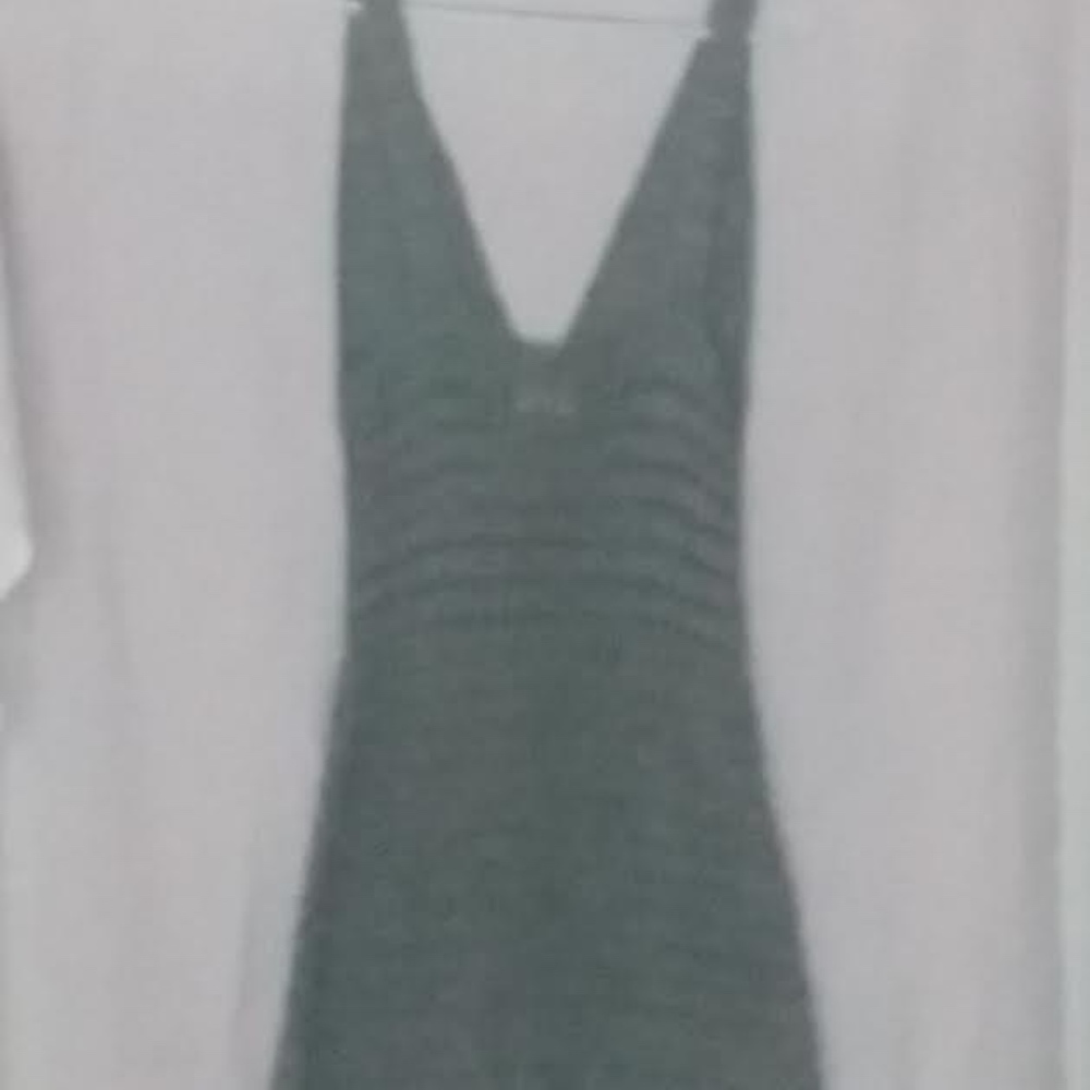 Sleeveless grey metallic dress with deep v neck